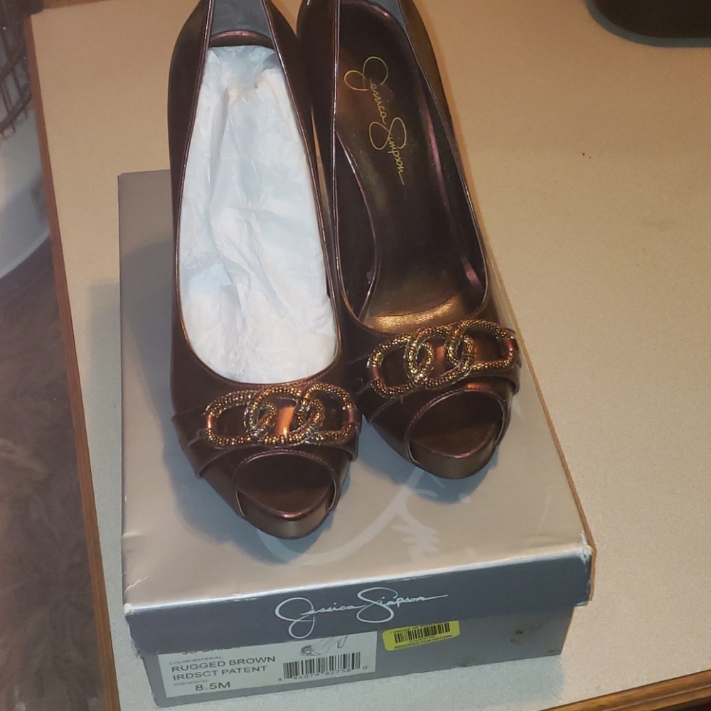 Jessica Simpson peep toe Daila Platform pumps.